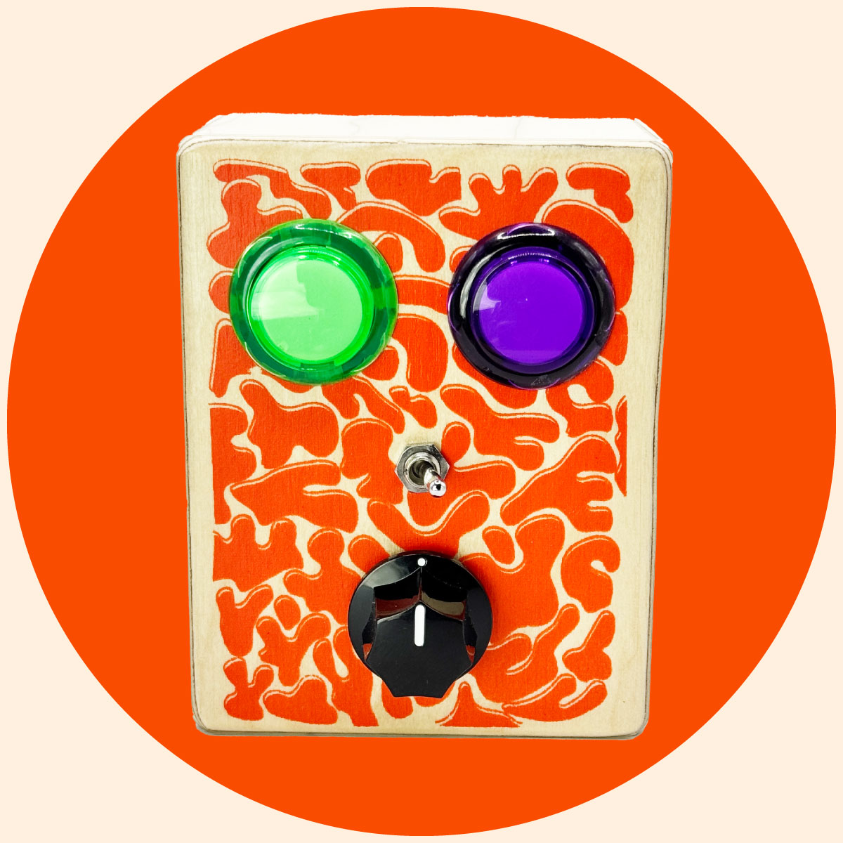 toy like audio recorder with large purple and green arcade buttons