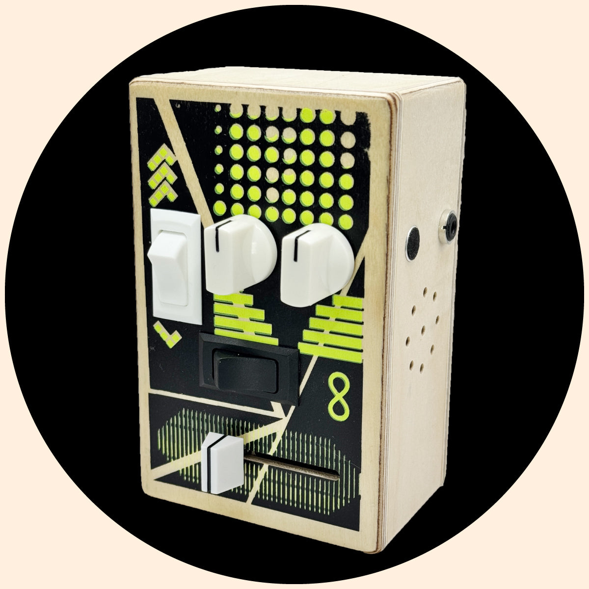 Toy-like electronic device with buttons and lights on a beige background