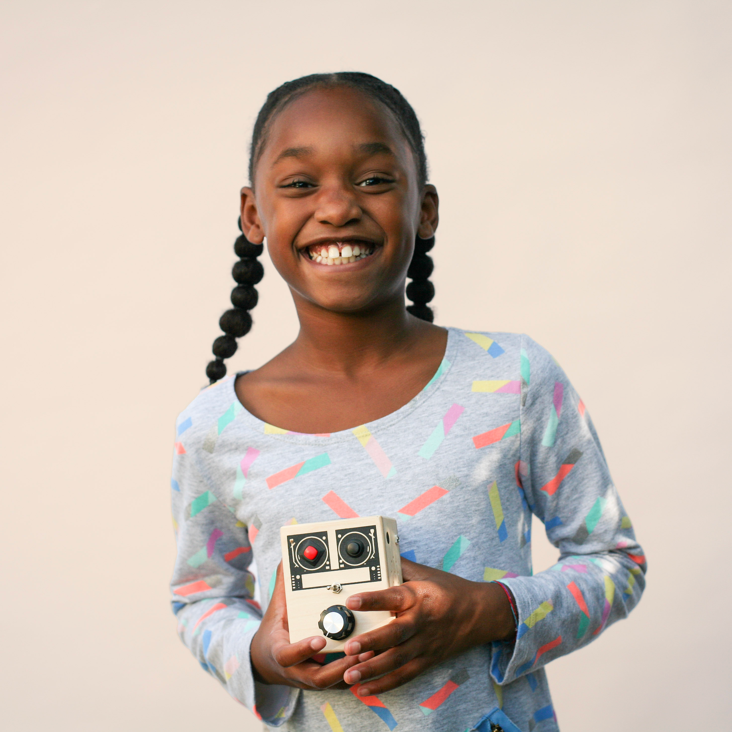 Girl playing with BrandNewNoise Loopy Lou musical toy